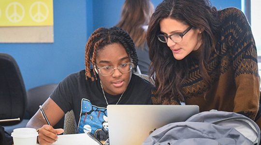 LRU design student with faculty member