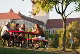 LRU students at a picnic table on campus