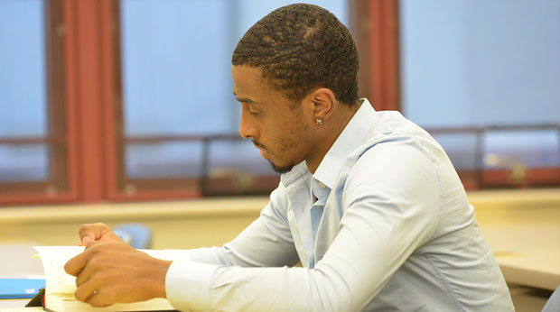 Student at desk in classroom