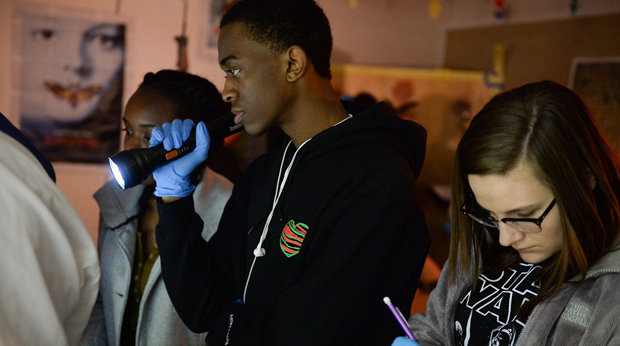 Forensic student doing exercise in class