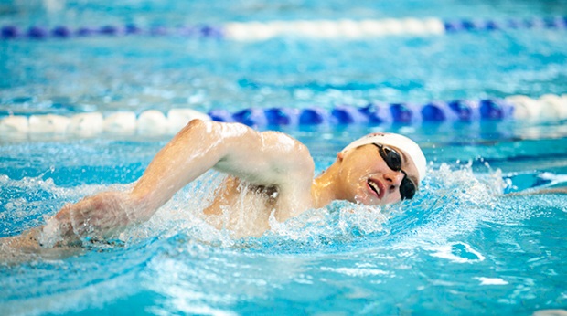 Woman swimming in pool