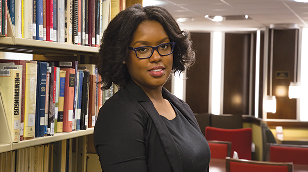 La Roche student in library