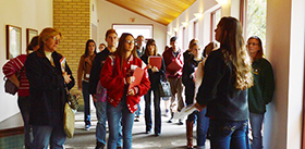 Undergraduate students gathered in Fr. Peter Horton Lounge