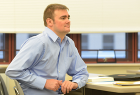 Graduate male accounting student in La Roche classroom