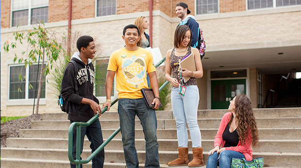 Students on back steps of Bold Hall