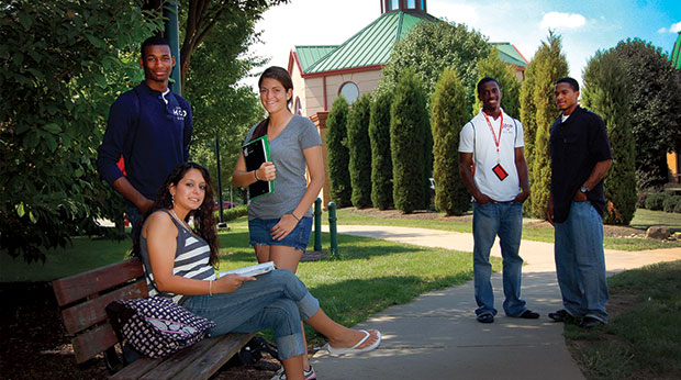 Students outside with Chapel in the background