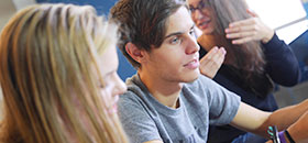 Undergraduate Students using a computer