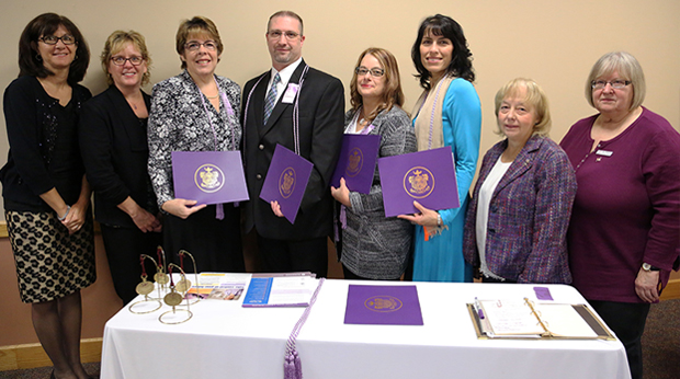 Students and faculty at the Theta Mu induction ceremony at La Roche