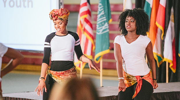 Students dancing at GLOBE Fashion Show