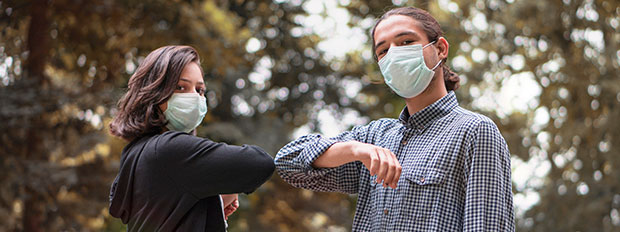 Social distancing. Elbow bump is new greeting to avoid spread of coronavirus or covid-19 - Avoid or Stop handshakes due to pandemic